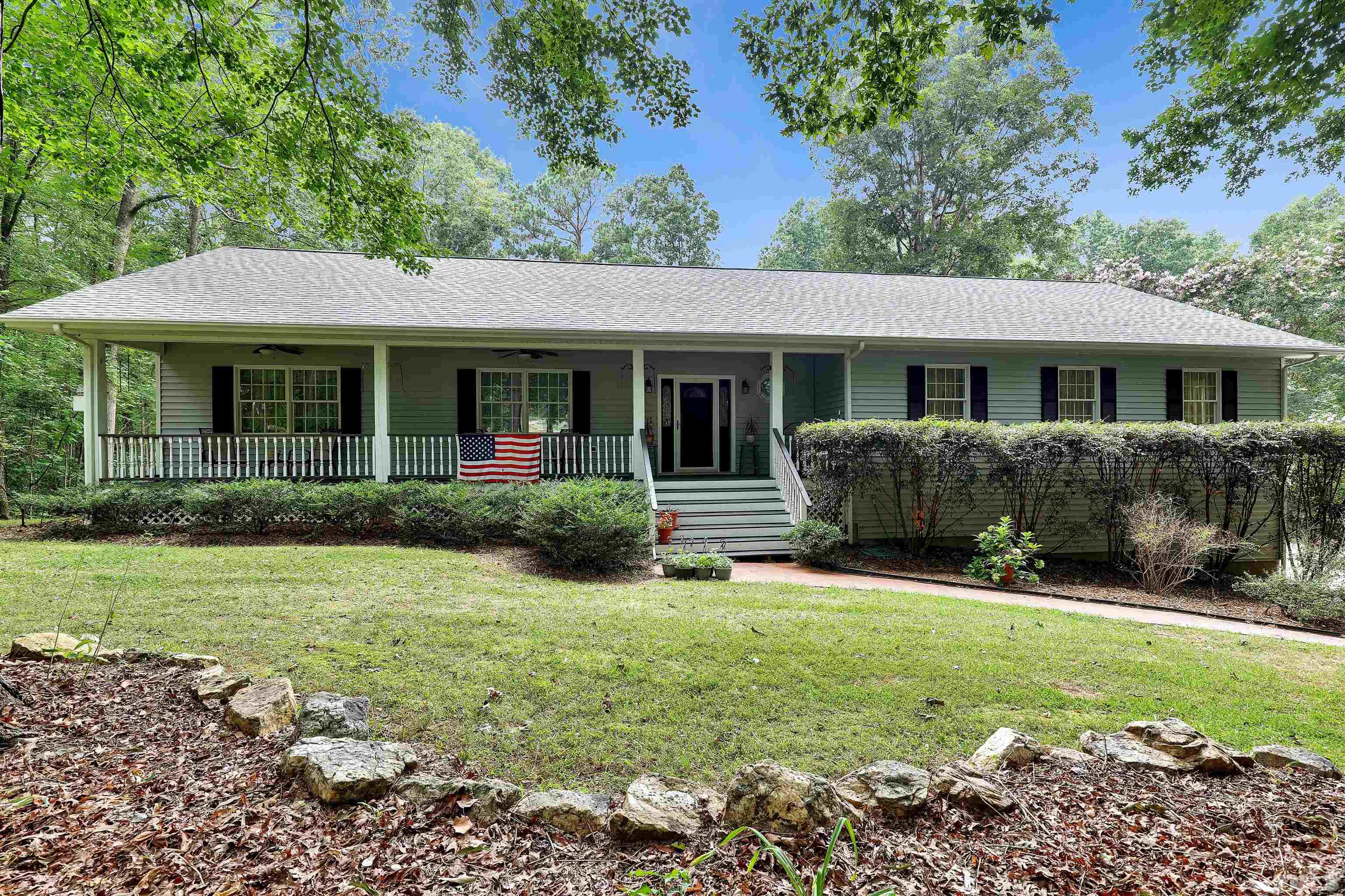 1008 Windstar Way Willow Spring, NC 27592 - Photo 49 of 51 a view of a house with a yard and potted plants