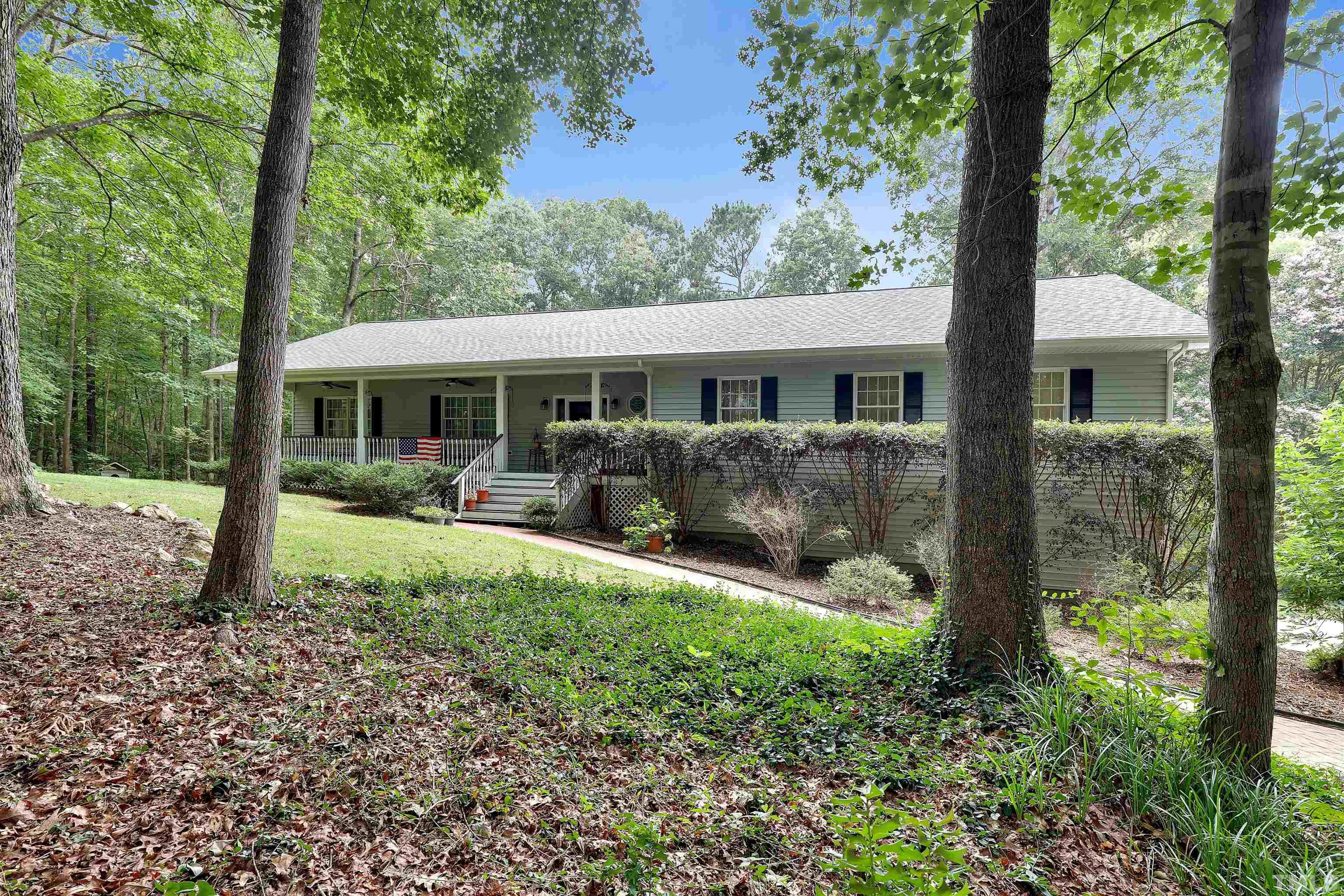 1008 Windstar Way Willow Spring, NC 27592 - Photo 50 of 51 a view of a house with backyard garden and sitting area