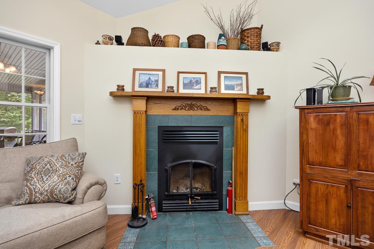 1008 Windstar Way Willow Spring, NC 27592 - Photo 5 of 51 a living room with furniture and a fireplace