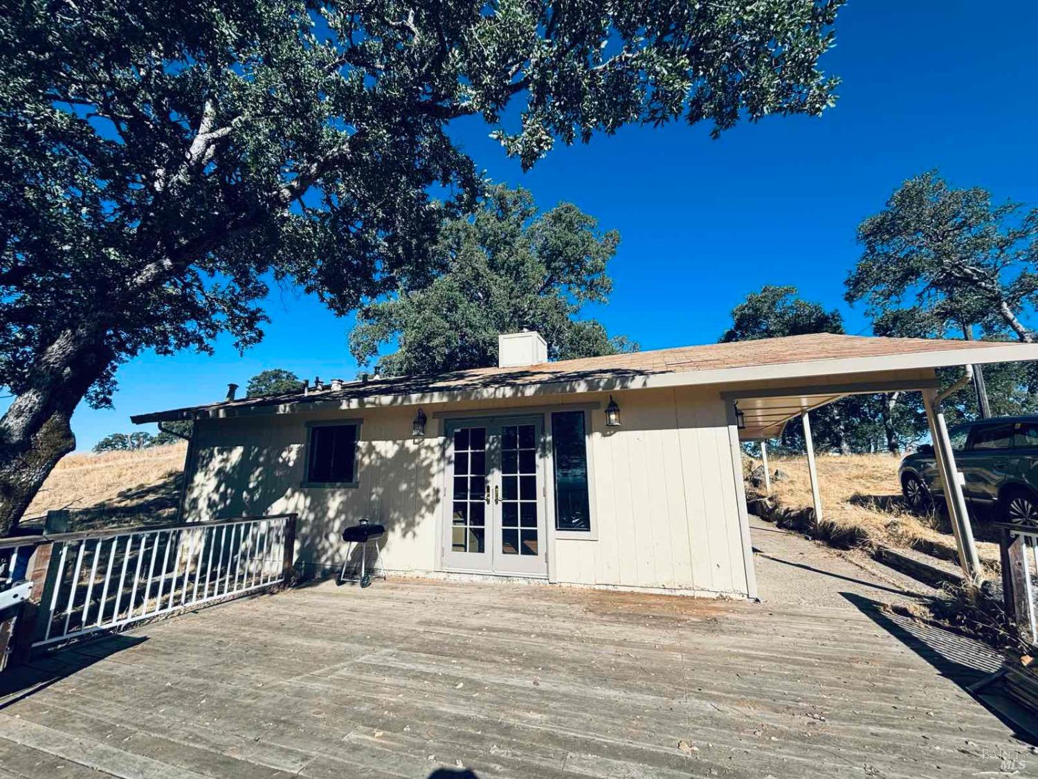 19511 Oak Haven Road Lower Lake, CA 95457 - Photo 2 of 39 a front view of a house with garden
