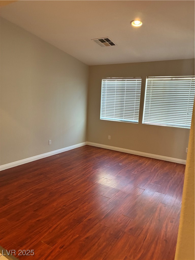 3346 Wasatch Cedars Street Las Vegas, NV 89122 - Photo 4 of 9 Spare room with light wood finished floors and recessed lighting