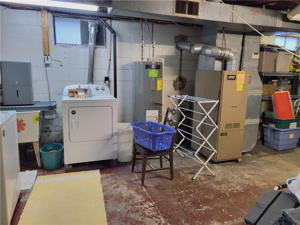 107 Wendel Road Herminie, PA 15637 - Photo 16 of 16 a utility room with dryer and washer