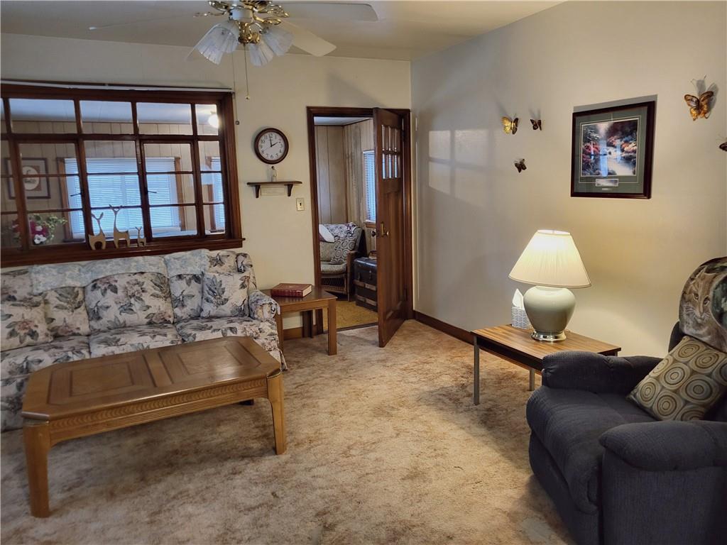 107 Wendel Road Herminie, PA 15637 - Photo 9 of 16 a living room with furniture and a large window