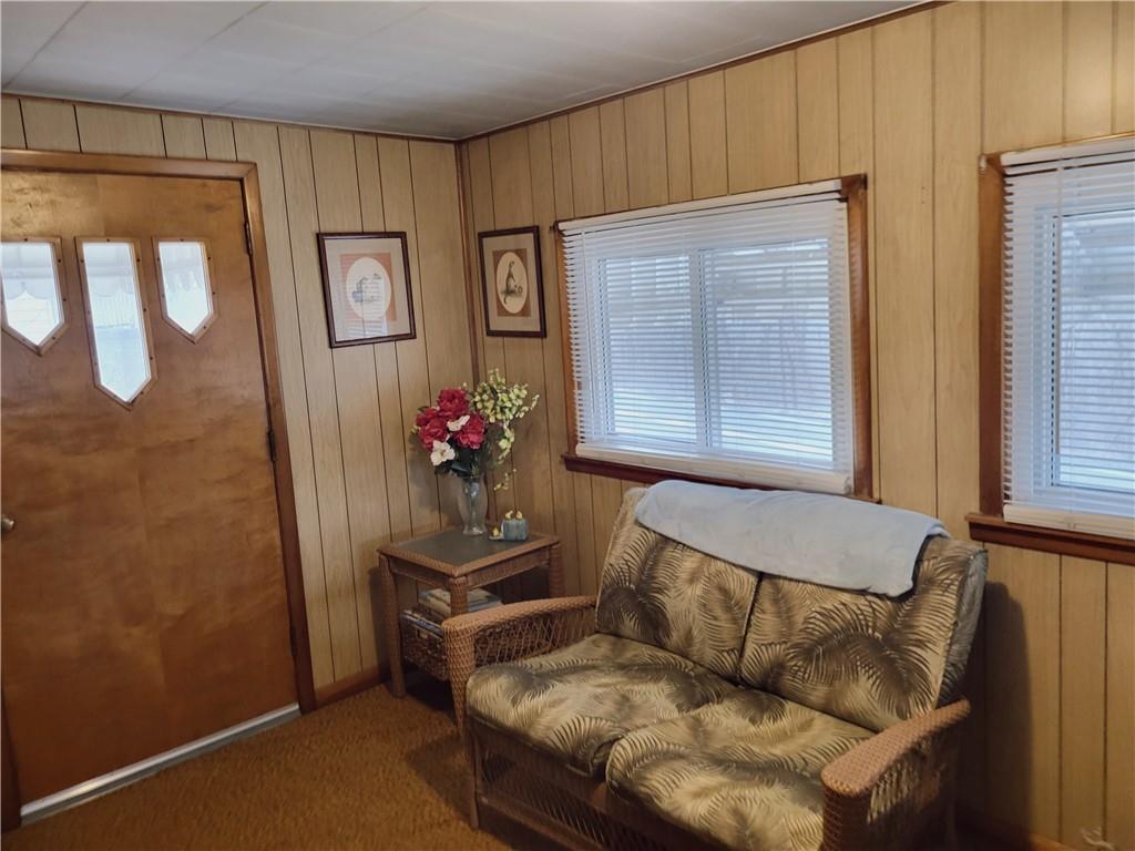 107 Wendel Road Herminie, PA 15637 - Photo 10 of 16 a living room with furniture and a window