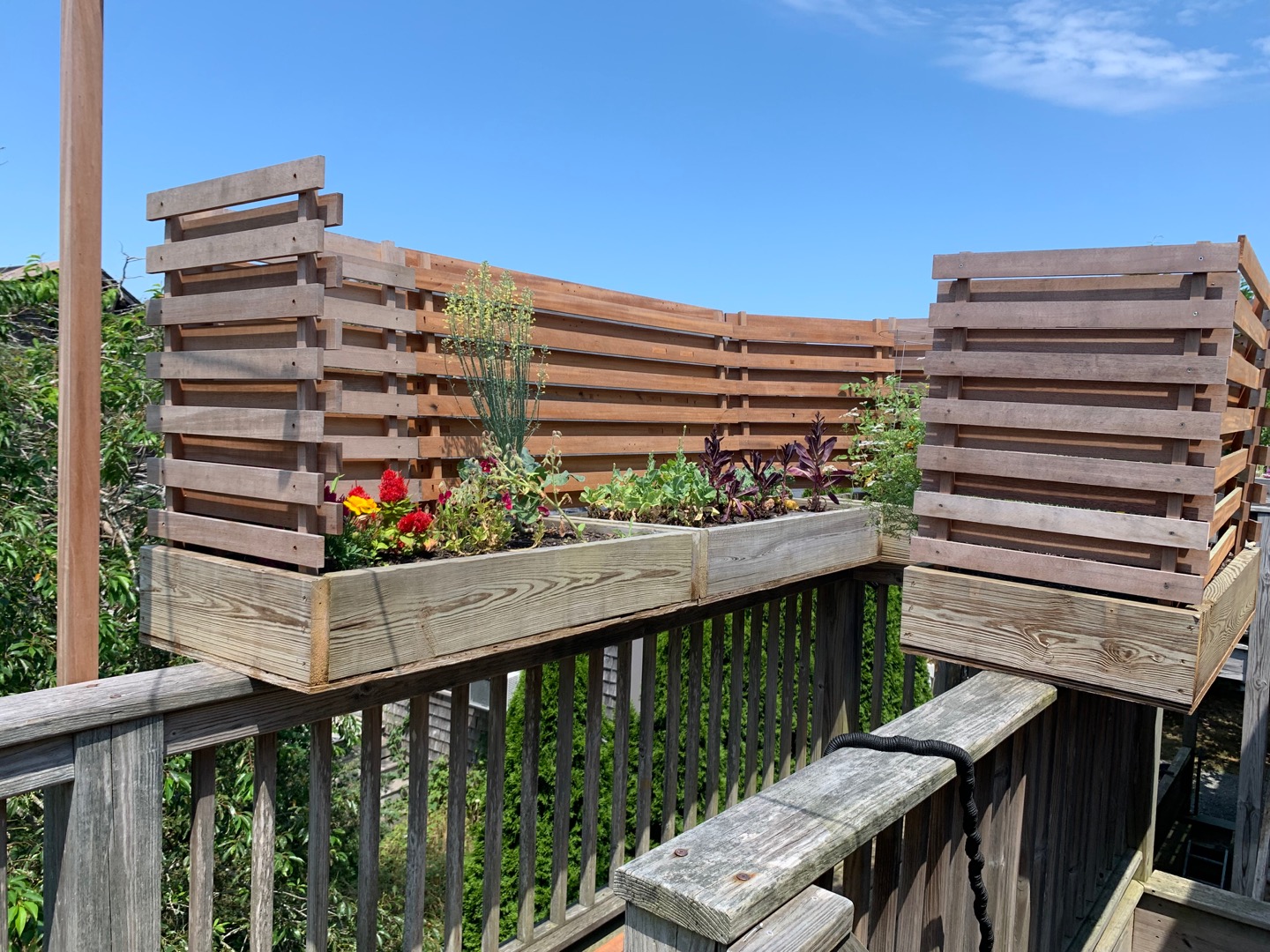 5 Salros Road Nantucket, MA 02554 - Photo 15 of 24 a view of a balcony with wooden floor and outdoor seating