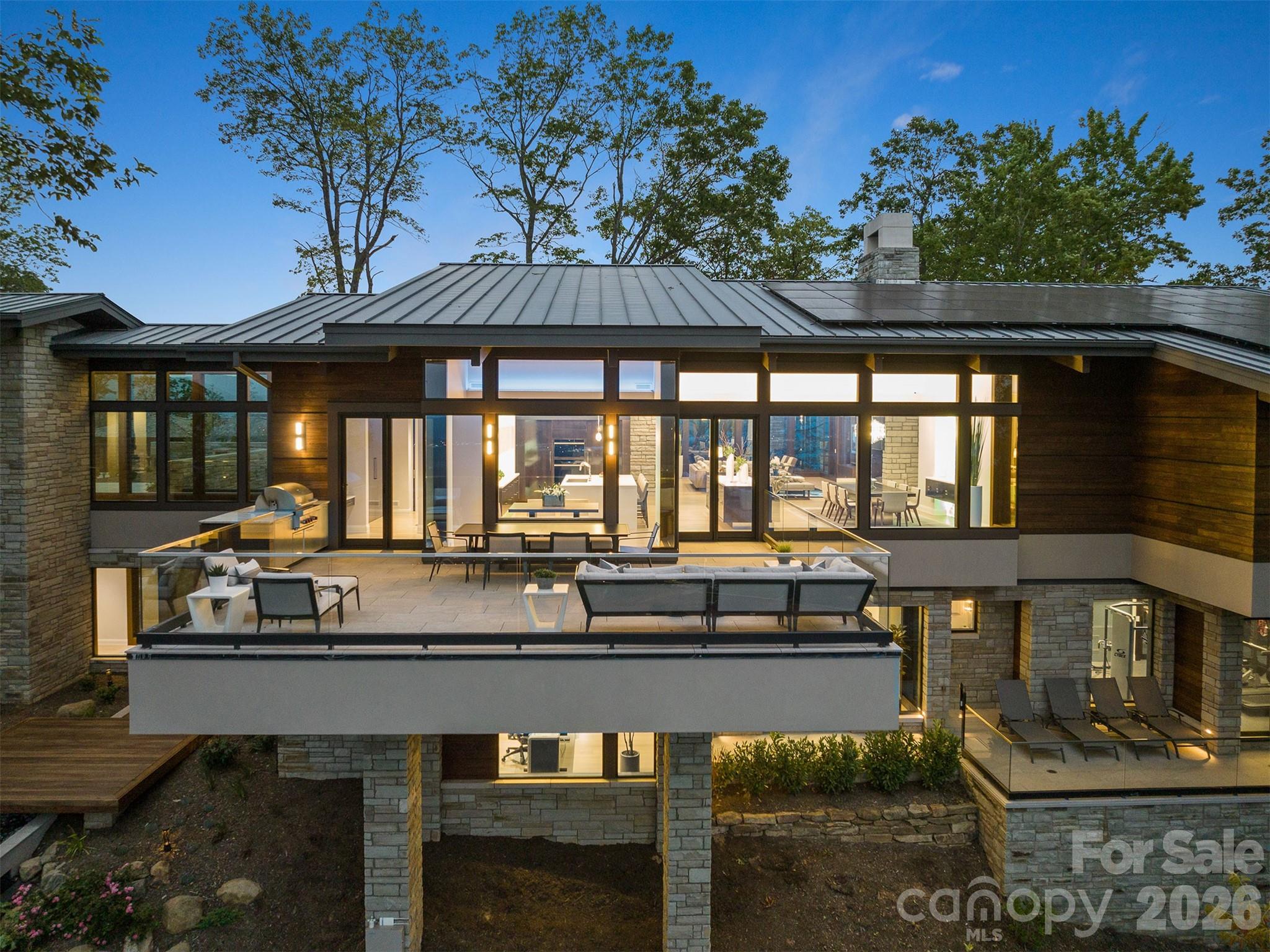 515 Cloud Top Way Arden, NC 28704 - Photo 4 of 41 a view of a chairs and table in patio
