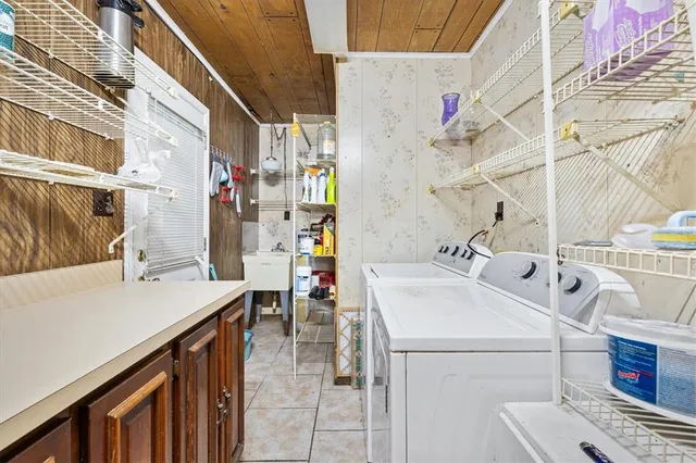 a view of a room with large windows and view of an outdoor space