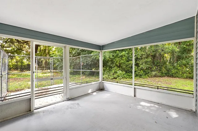 a view of a room with an empty space