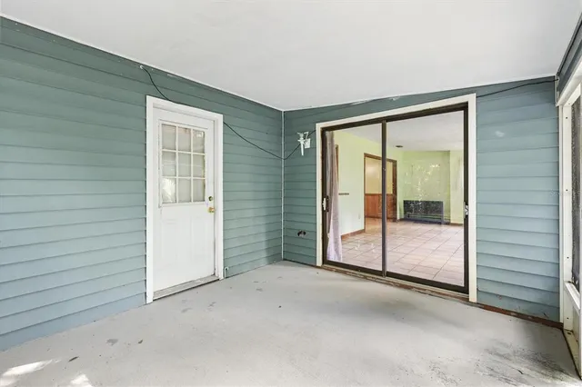 a view of a room with window and lake view