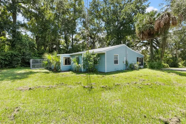 a view of a hallway with a chandelier