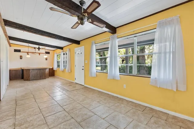 a view of an entryway with a chandelier