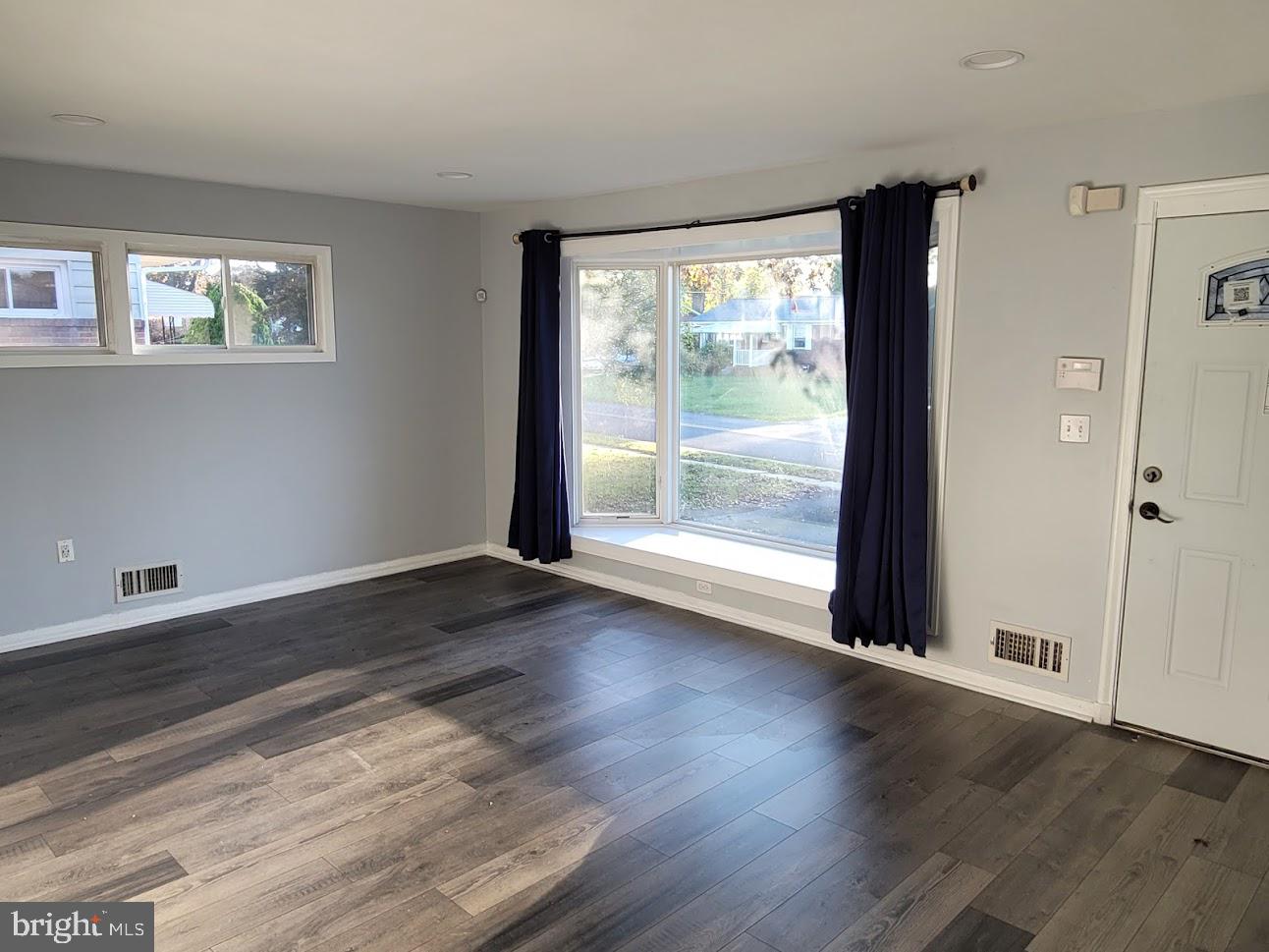 7408 Rockridge Road Baltimore, MD 21208 - Photo 2 of 14 Open & inviting living room area