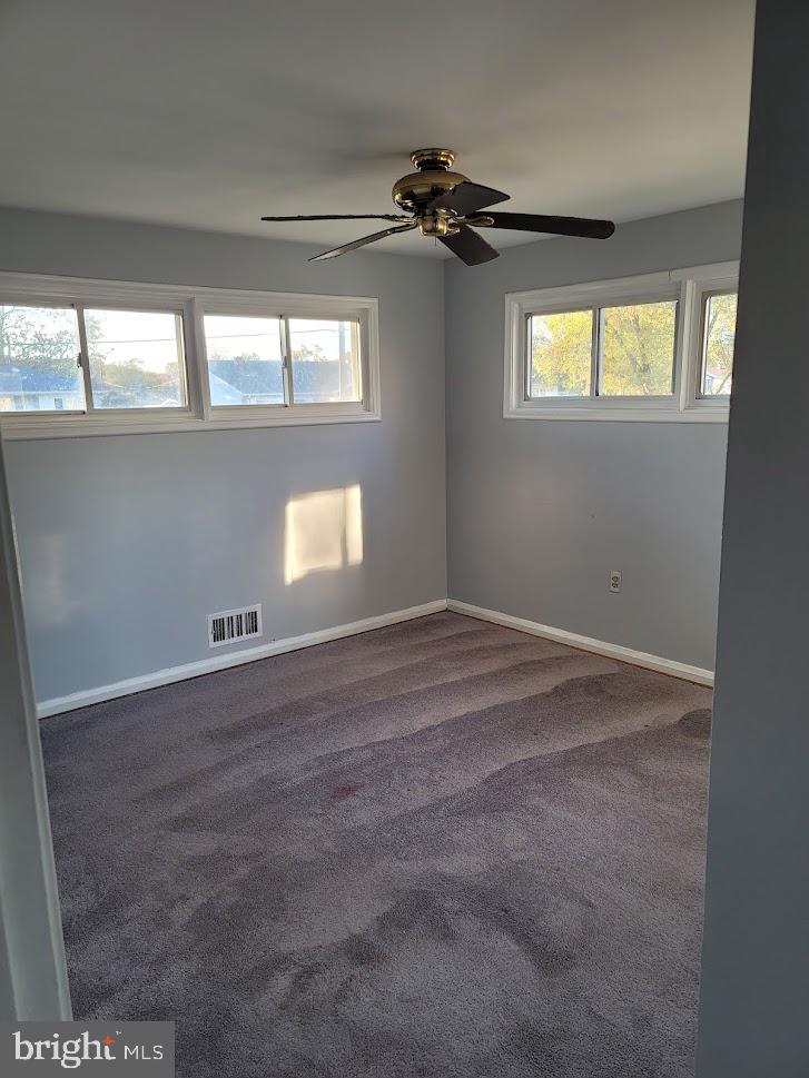 7408 Rockridge Road Baltimore, MD 21208 - Photo 4 of 14 Primary bedroom with lots of natural light