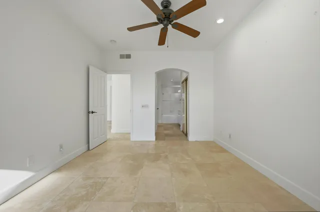 a bathroom with a sink a vanity and a mirror
