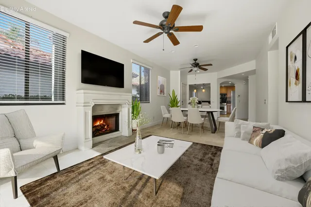 a living room with furniture fireplace and a flat screen tv