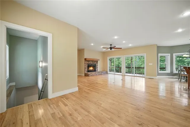 a kitchen with stainless steel appliances granite countertop a stove sink and refrigerator