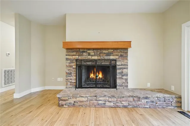a kitchen with stainless steel appliances granite countertop a stove and a sink