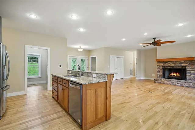 a bathroom with a glass shower door