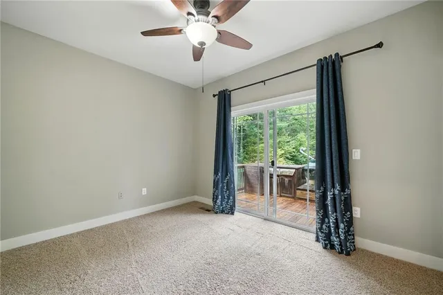 a kitchen with granite countertop a sink stainless steel appliances and cabinets