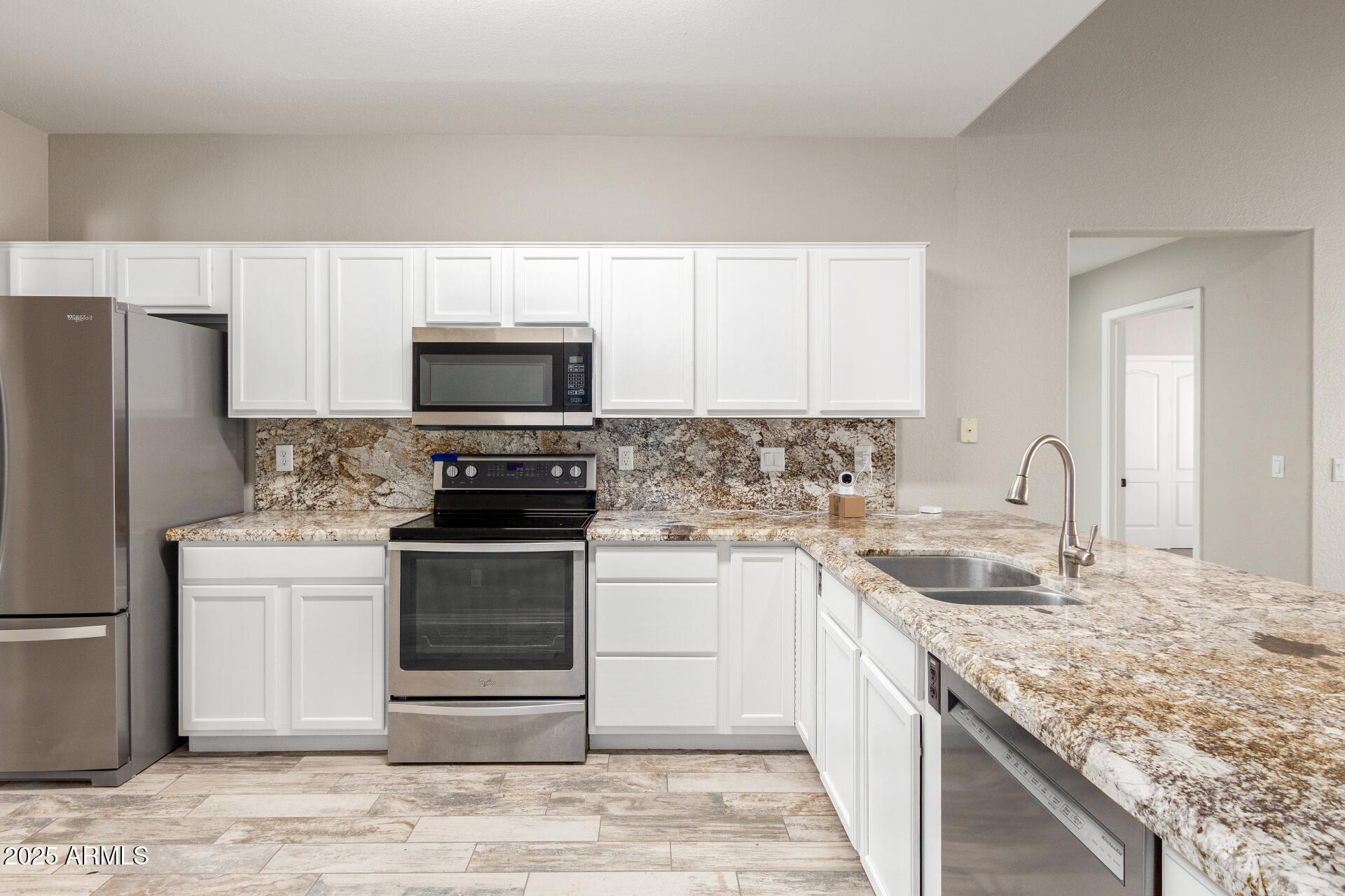 11232 East Dover Street Mesa, AZ 85207 - Photo 14 of 31 a kitchen with a sink stove and refrigerator