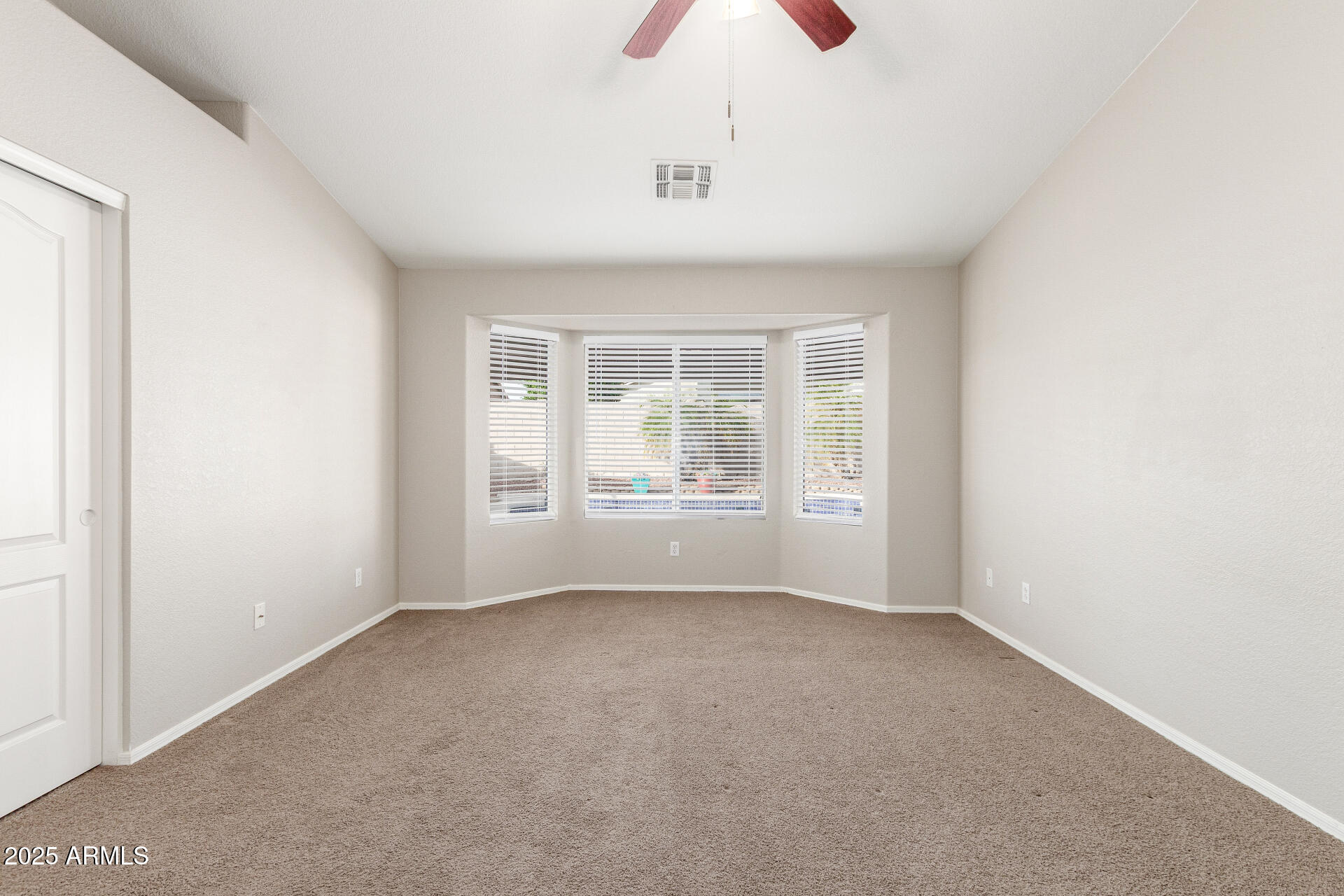 11232 East Dover Street Mesa, AZ 85207 - Photo 15 of 31 an empty room with windows