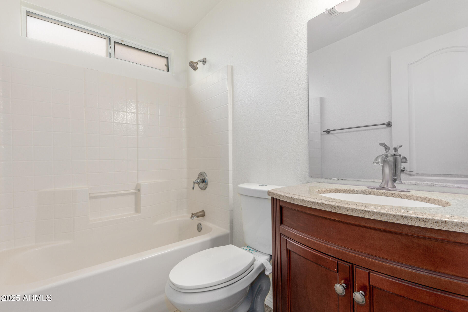 11232 East Dover Street Mesa, AZ 85207 - Photo 22 of 31 a bathroom with a sink a toilet and shower