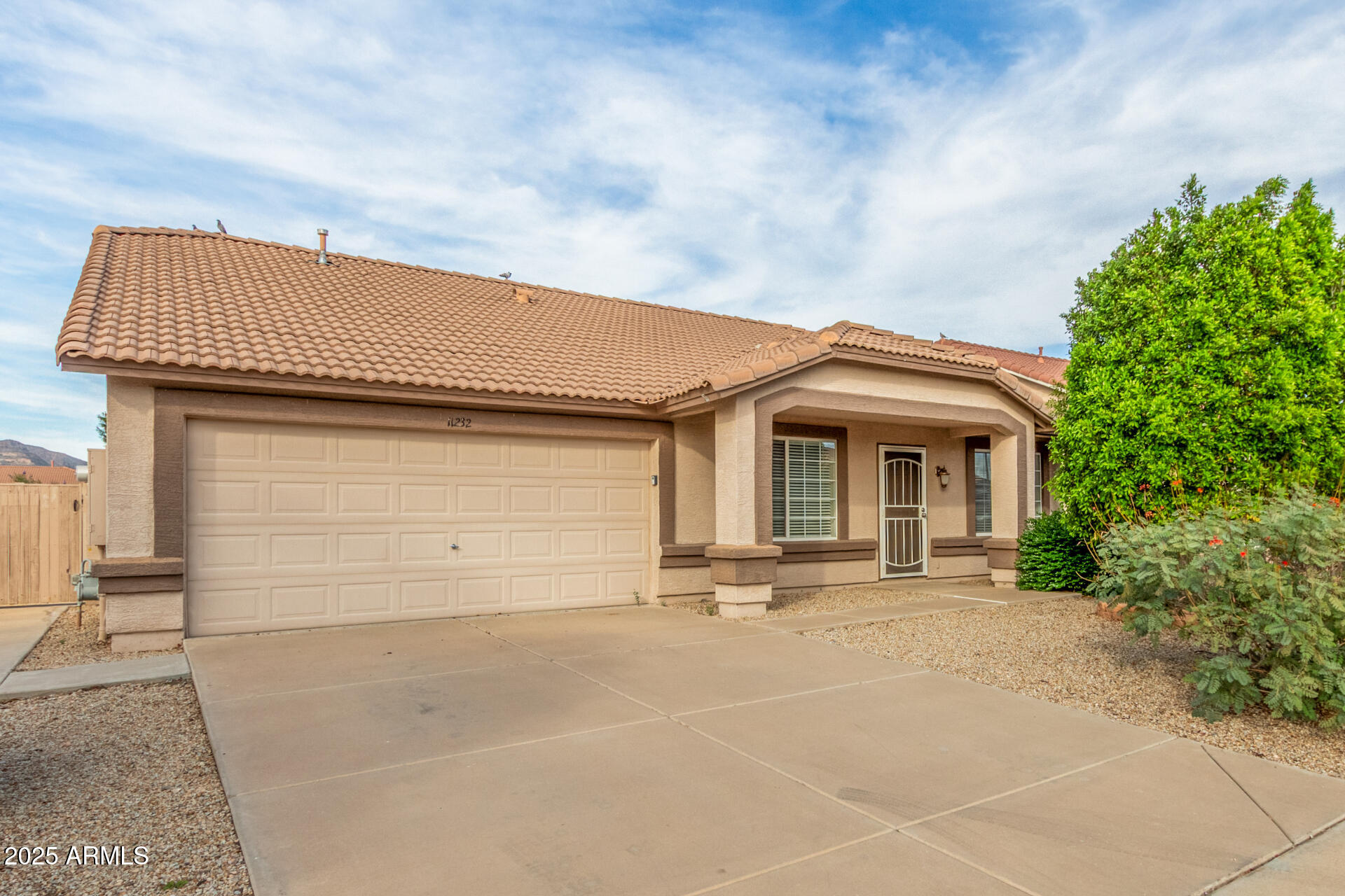 11232 East Dover Street Mesa, AZ 85207 - Photo 3 of 31 a front view of a house with a garage