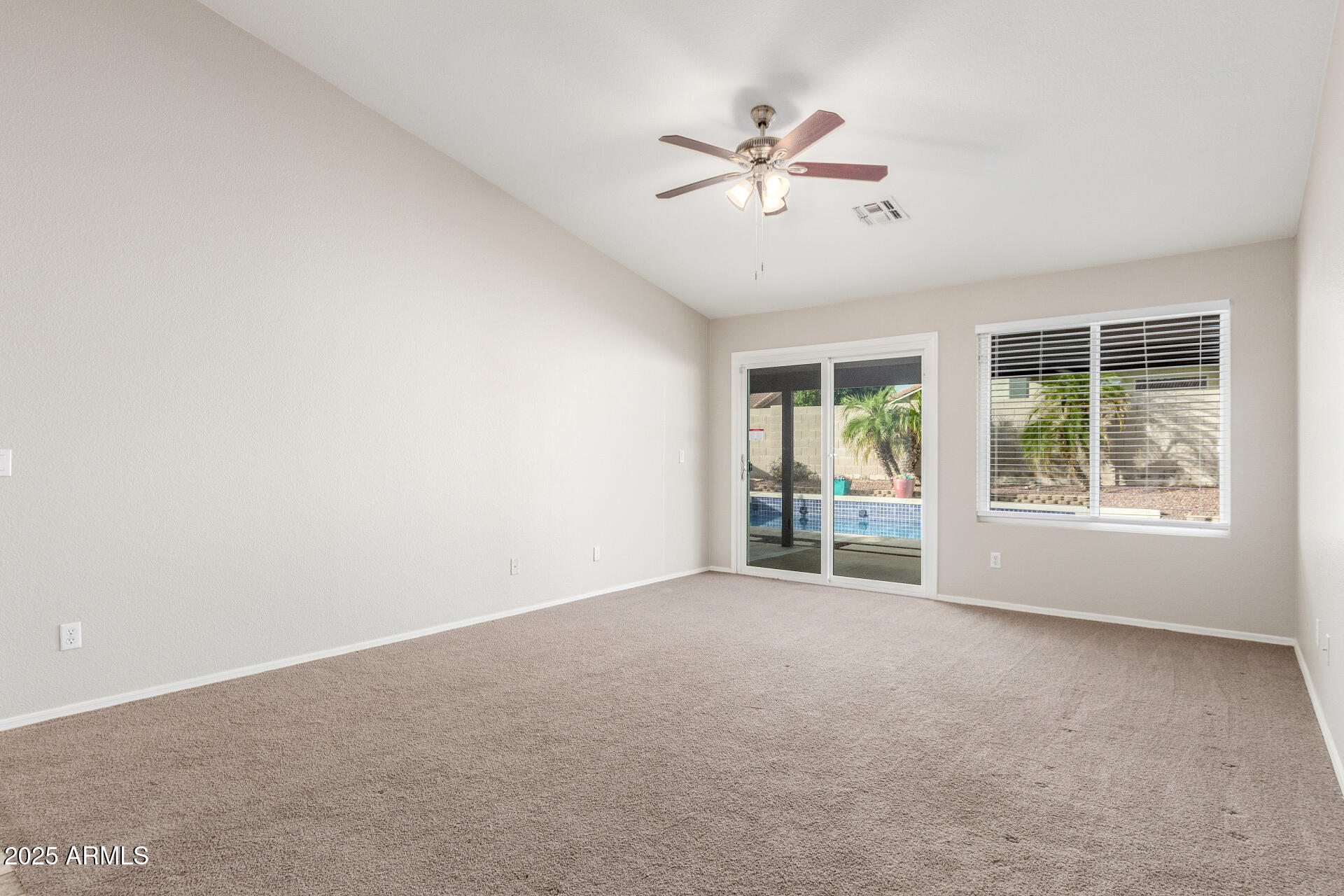11232 East Dover Street Mesa, AZ 85207 - Photo 9 of 31 a view of an empty room with a window