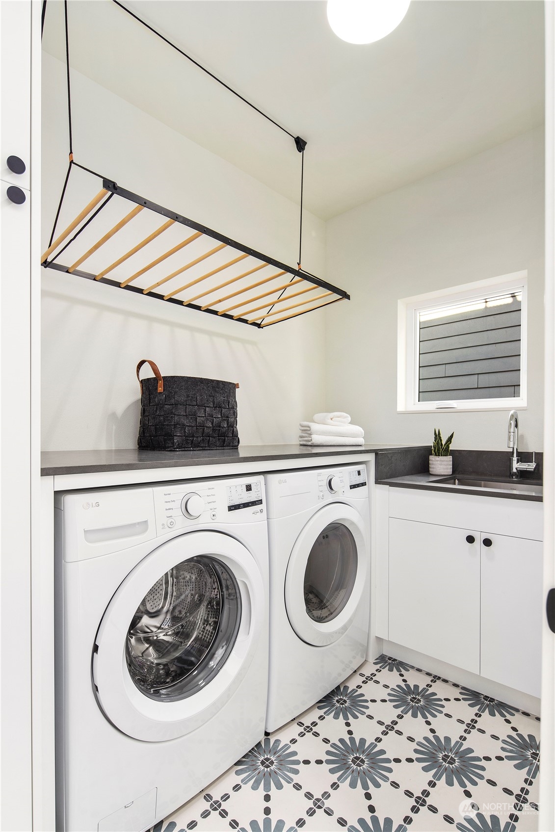 2308 North 38th Street Seattle, WA 98103 - Photo 15 of 40 a utility room with sink dryer and washer