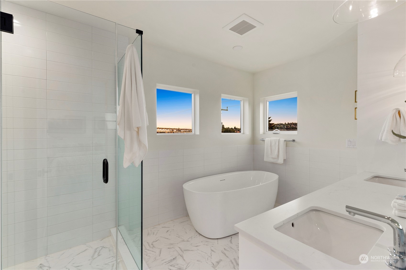 2308 North 38th Street Seattle, WA 98103 - Photo 25 of 40 a bathroom with a toilet sink and shower