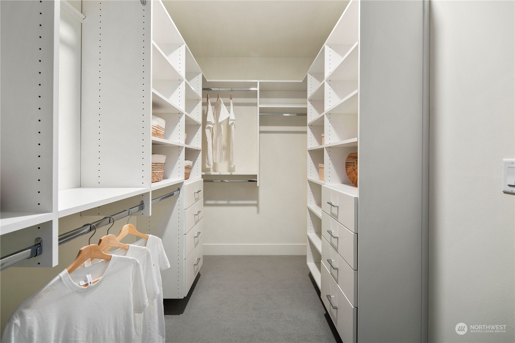 2308 North 38th Street Seattle, WA 98103 - Photo 26 of 40 a view of walk in closet with empty racks