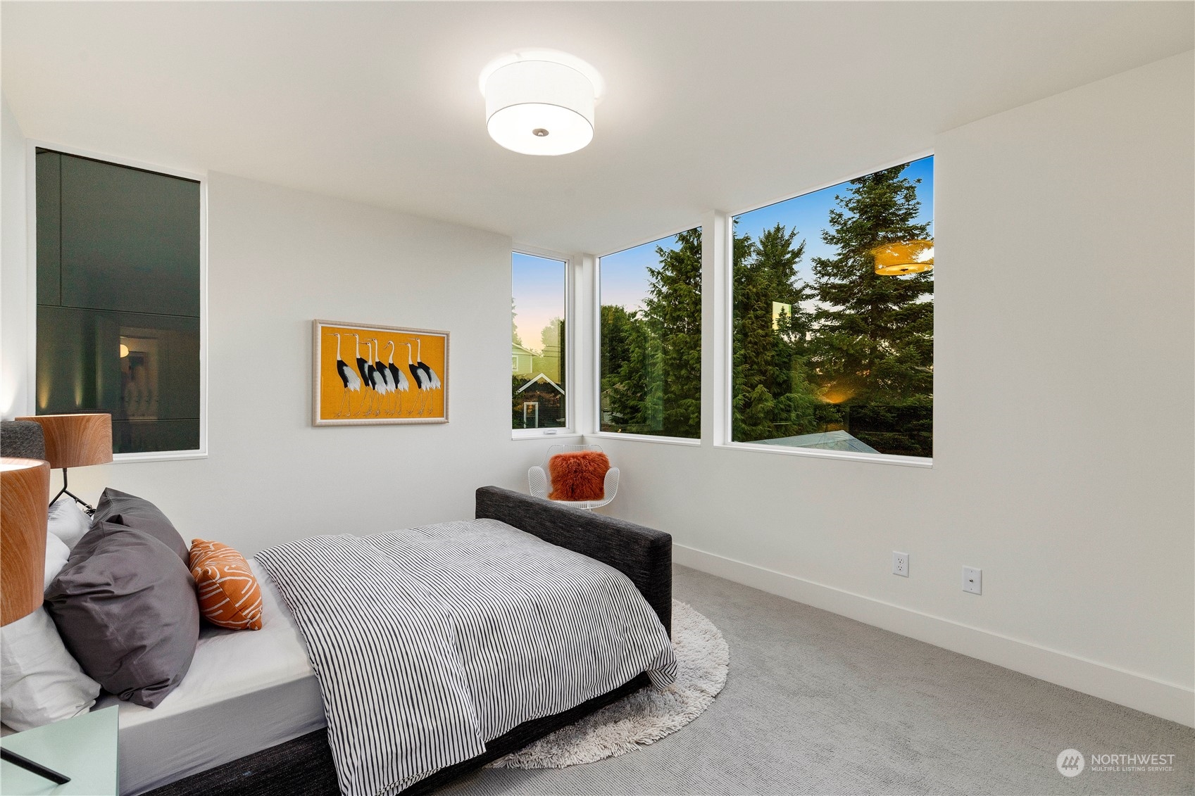 2308 North 38th Street Seattle, WA 98103 - Photo 28 of 40 a bedroom with a bed and a window