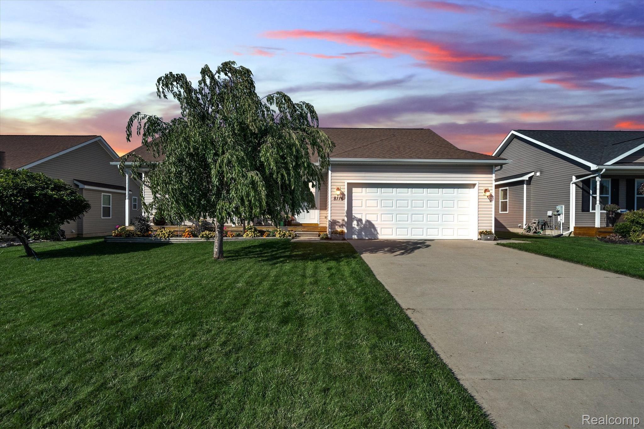 8116 Eagle Ridge Lane Fowlerville, MI 48836 - Photo 1 of 36 Front of Home, Mature Landscaping