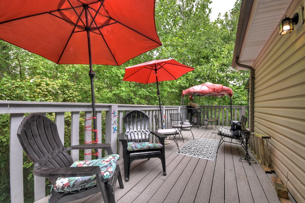 1359 Salem Road Mineral Bluff, GA 30559 - Photo 16 of 18 an outdoor space with furniture and umbrella
