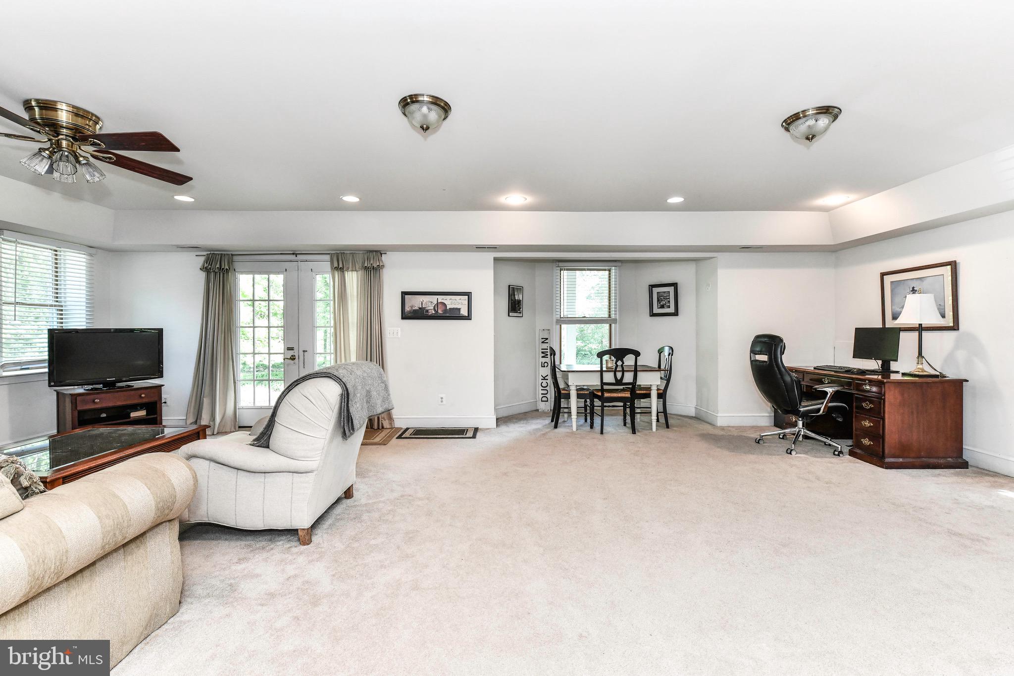 807 Old County Road Severna Park, MD 21146 - Photo 16 of 24 Oversized walkout family room with full windows