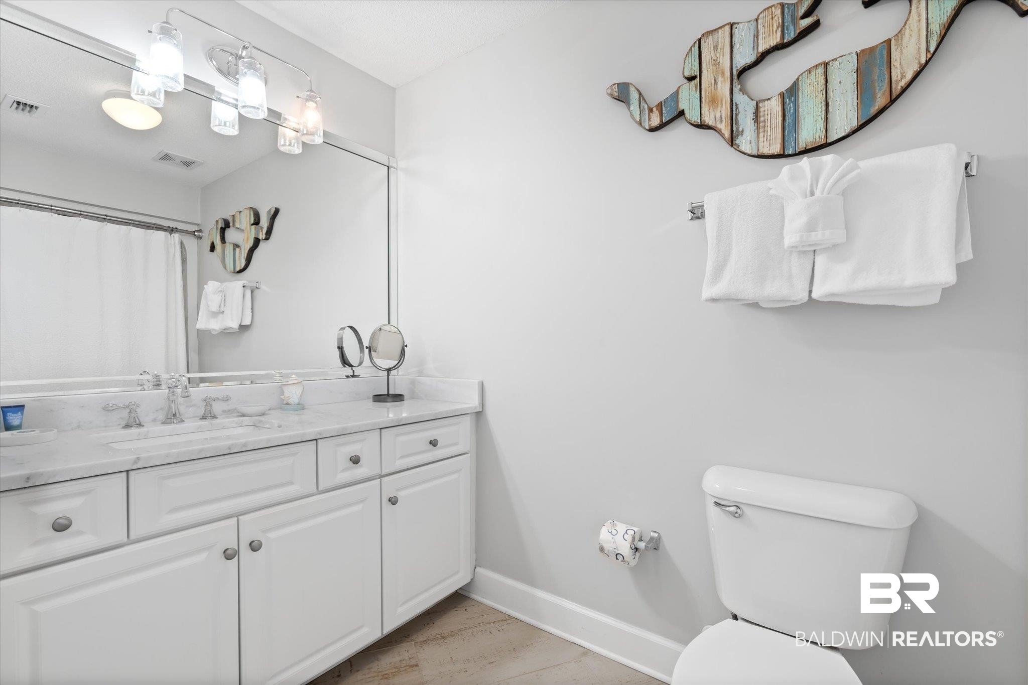 27582 Canal Road, Unit 2611 Orange Beach, AL 36561 - Photo 25 of 37 Bathroom with vanity and toilet