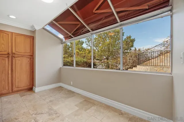 a view of a room with a large window