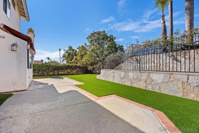 a view of a backyard with a garden