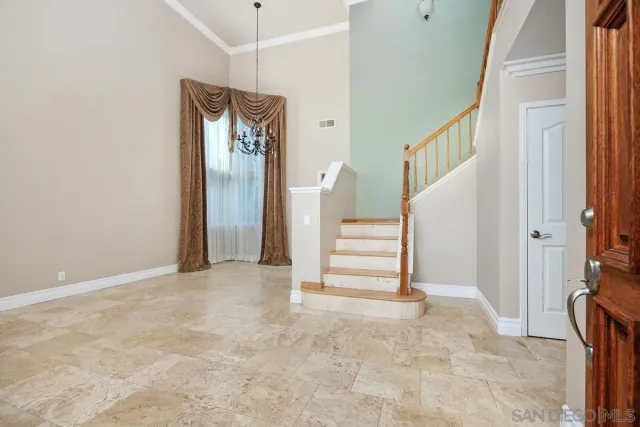 a view of an entryway with staircase