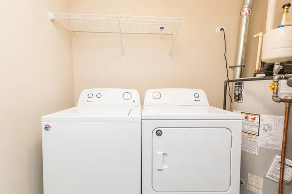 a utility room with dryer and washer
