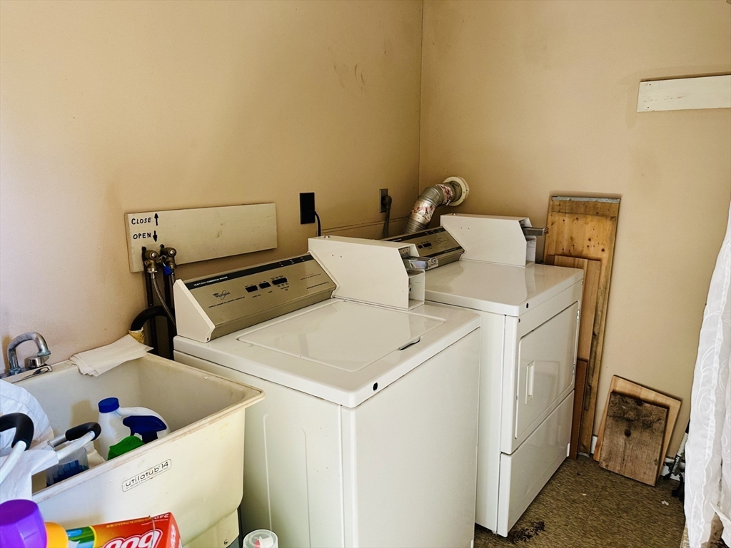 693 Concord Street Framingham, MA 01702 - Photo 11 of 19 a utility room with dryer and washer