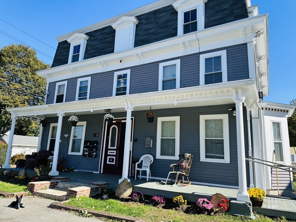693 Concord Street Framingham, MA 01702 - Photo 19 of 19 a front view of a building with outdoor seating