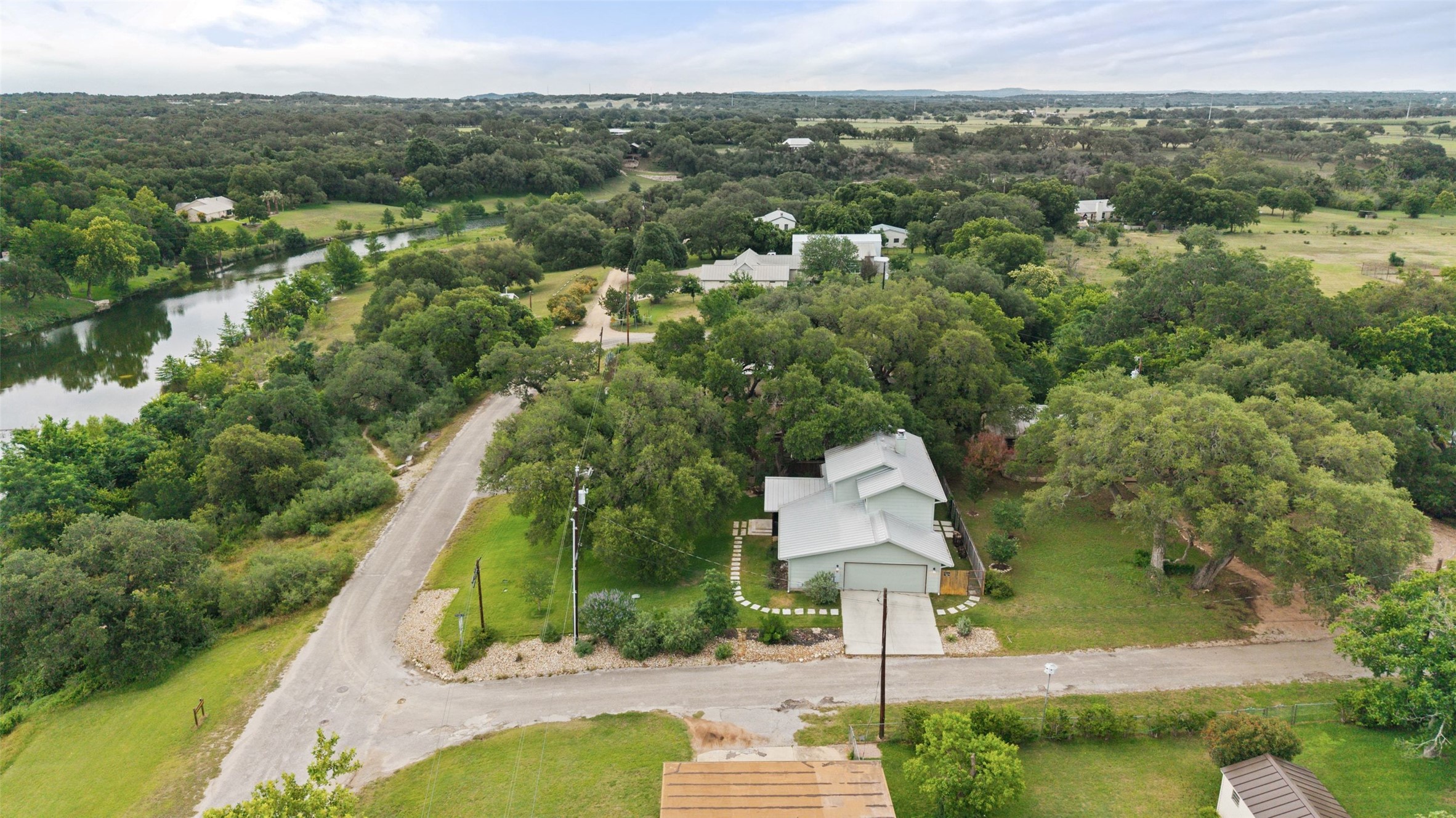701 River Road Blanco, TX 78606 - Photo 35 of 38 a view of a city with lush green forest