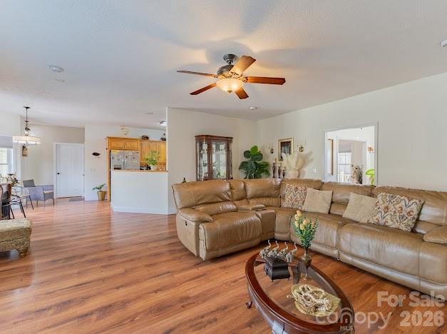3131 Christie Road Hudson, NC 28638 - Photo 18 of 48 a living room with furniture and a wooden floor