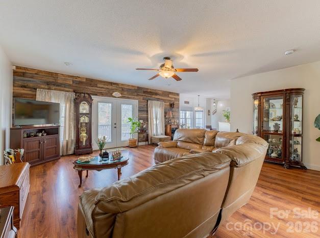 3131 Christie Road Hudson, NC 28638 - Photo 20 of 48 a living room with furniture ceiling fan and a wooden floor