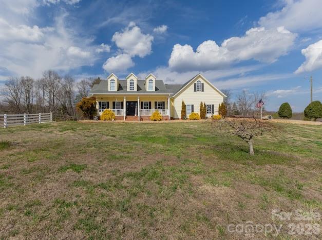3131 Christie Road Hudson, NC 28638 - Photo 2 of 48 a front view of a house with a yard