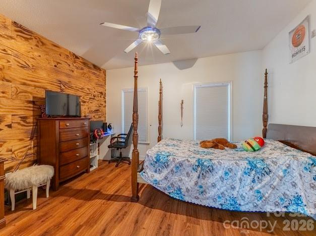 3131 Christie Road Hudson, NC 28638 - Photo 34 of 48 a bedroom with bed and wooden floor