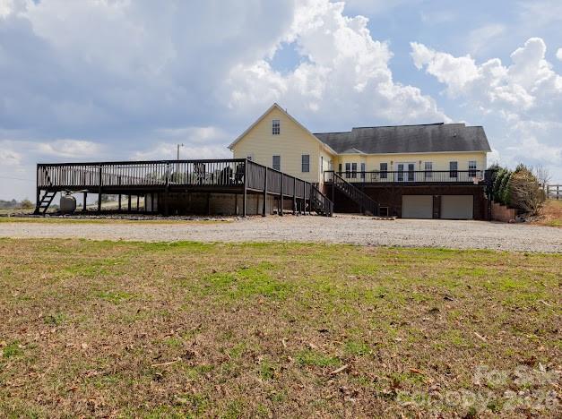 3131 Christie Road Hudson, NC 28638 - Photo 5 of 48 a swimming pool with an outdoor seating