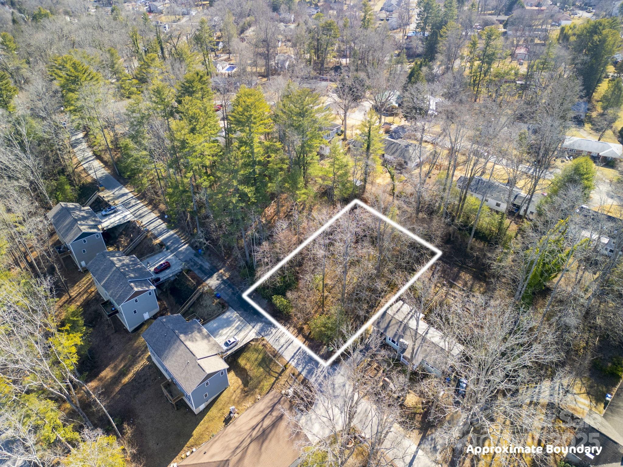 0 Upper Ridgewood Boulevard Hendersonville, NC 28791 - Photo 6 of 11 an aerial view of house with yard