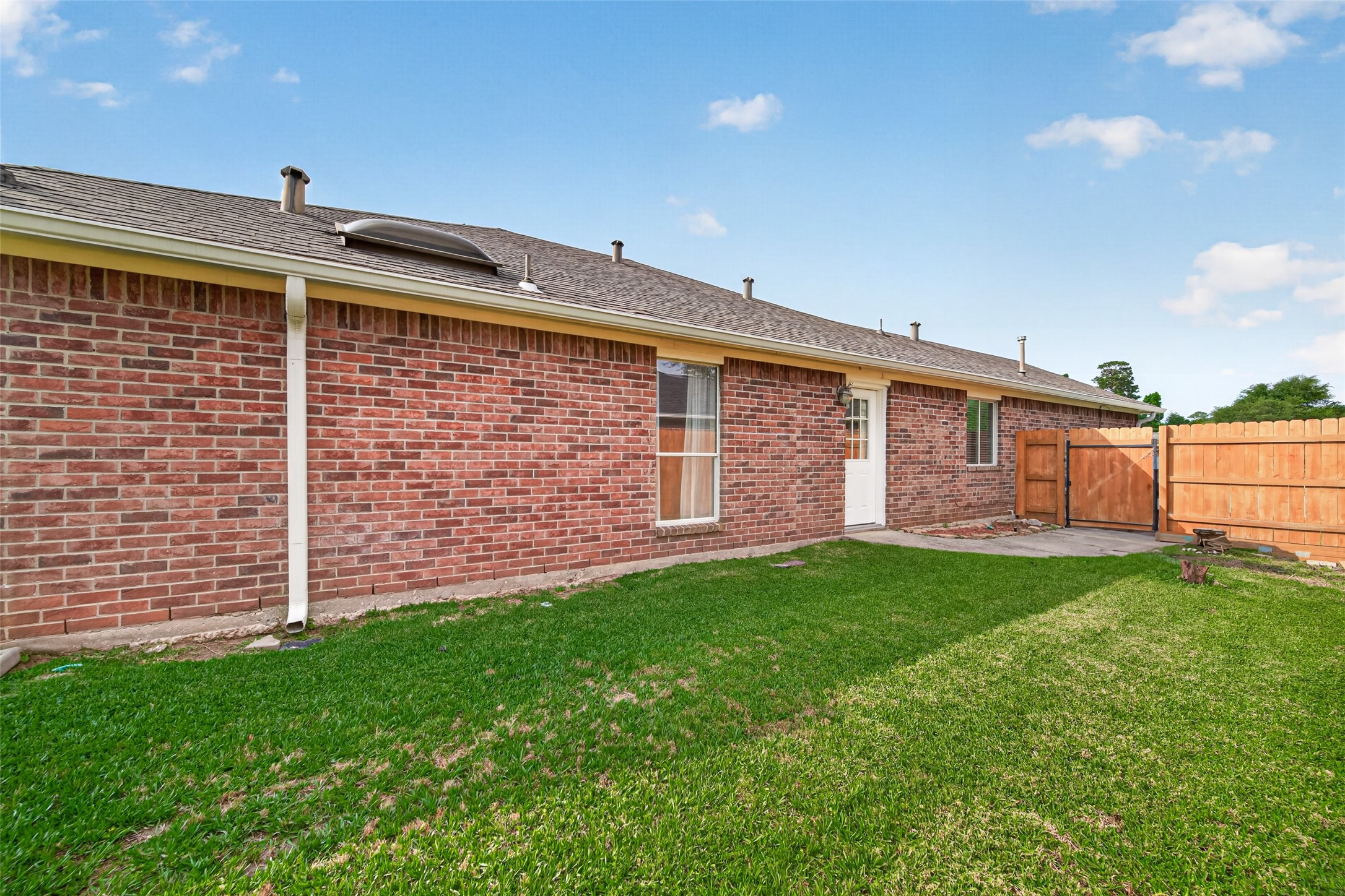 23914 Glengate Drive Spring, TX 77373 - Photo 47 of 49 a front view of a house with garden